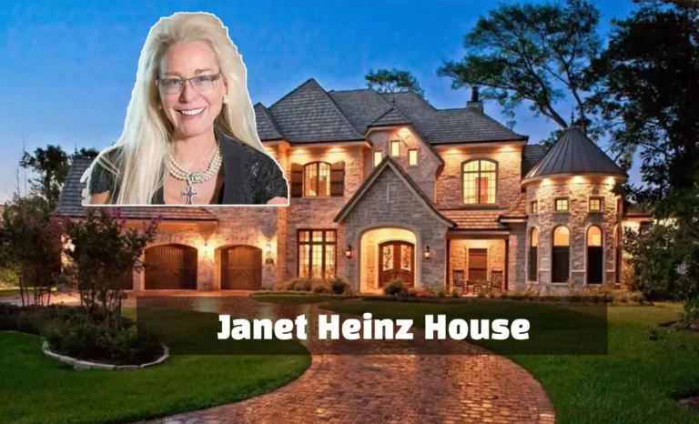 Colonial Revival-style Janet Heinz House overlooking the ocean with white siding, blue shutters, and a private dock on Marblehead Neck.